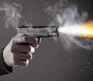 pistol gun being fired fire coming from barrel