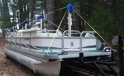 setup straps and poles for shrink wrapping a pontoon boat