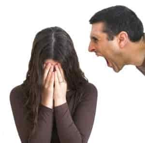 verbal abuse man screaming at crying woman as she has her hands over her face