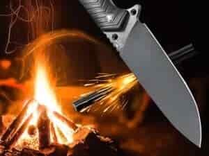 knife with fire and sparks in background